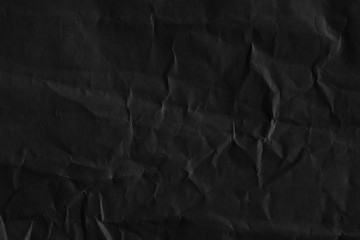 Dark black paper background creased crumpled posters old torn ripped surface grunge textures placard backdrop empty space for text