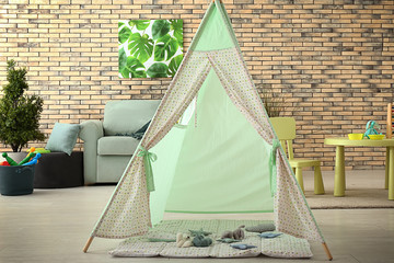 Cozy kids room interior with play tent