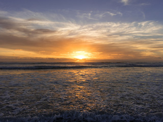 Fototapeta premium Piercing sunset seascape tranquil