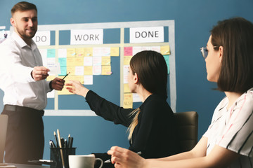 Young business people at meeting in office