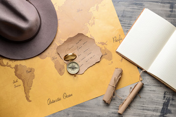 Map with compass and letters on table