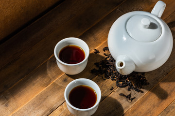 white chinese tea set on wooden table