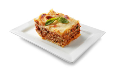 Plate with tasty baked lasagna on white background