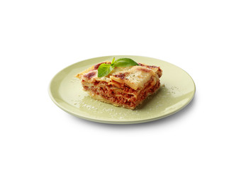 Plate with tasty baked lasagna on white background
