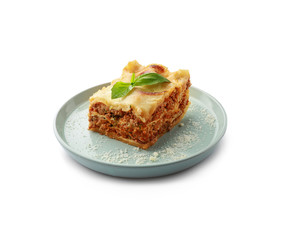 Plate with tasty baked lasagna on white background