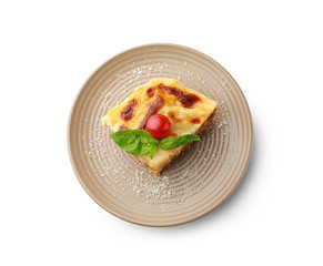 Plate with tasty baked lasagna on white background