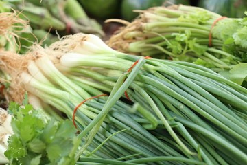 Spring onions at market