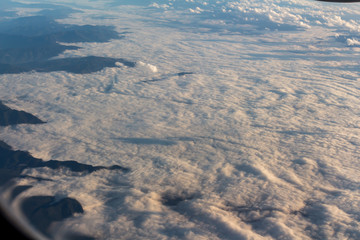 Fototapeta premium Clouds sky looking from the plane