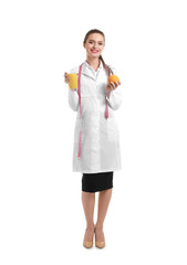 Portrait of female nutritionist on white background