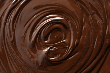 Obraz na płótnie Canvas Texture of melted chocolate, closeup