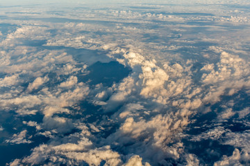 Naklejka premium Clouds sky looking from the plane