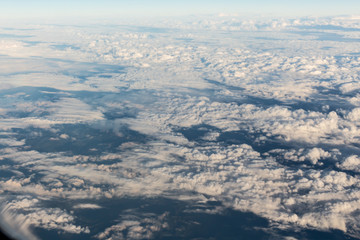 Fototapeta na wymiar Clouds sky looking from the plane