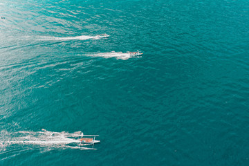 Traditional balinese fisherman's boats in the ocean, Lovina, Bali, Indonesia
