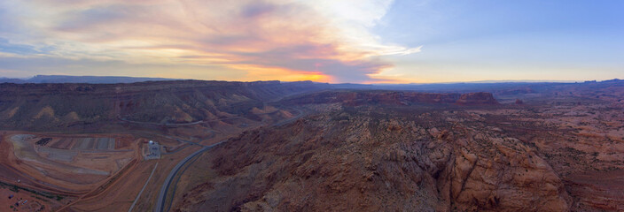 Mesa and canyon landscape panorama aerial view at sunset near Arches National Park, Moab, Utah, USA.