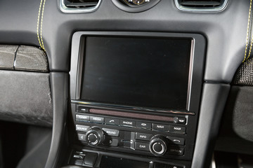 Fototapeta na wymiar Infotainment system in sports car