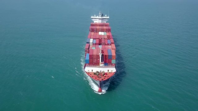 Large container ship at sea - Aerial footage.