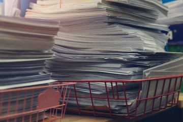 Business and finance concept of office working, Pile of unfinished documents on office desk, Stack of business paper