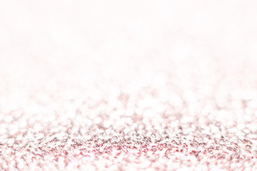 Pink glitter texture Festive sparkling sequins background closeup. Wpaper for Valentine, New Year or Christmas Holidays.