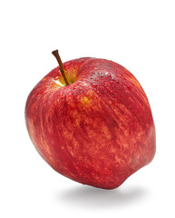 red apple is a storehouse of vitamins on a white background