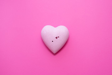 pink heart on pink background. copy space. concept of love. day valentine, valentine's day