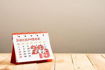 calendar with December 2019 lettering isolated on beige with copy space