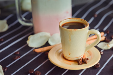 Espresso cup on the background of coffee machines, black coffee morning on coffee maker