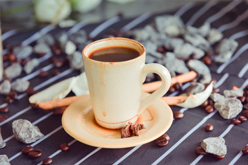 Espresso cup on the background of coffee machines, black coffee morning on coffee maker