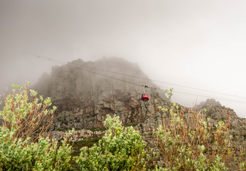 Table Mountain Aerial Cableway into the fog, Cape Town, South africa - Powered by Adobe