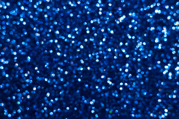 Fototapeta premium Golden glitter festive background with bokeh lights. Celebration concept for Holidays and anniversary.