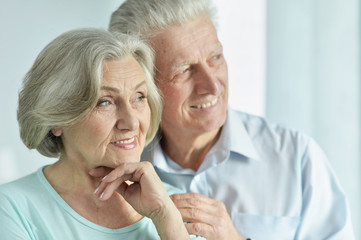 Portrait of cute happy senior couple close-up