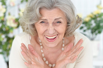 Close-up portrait of happy senior woman portrait