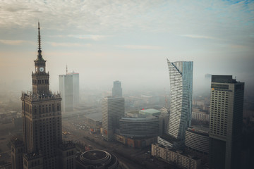 Warsaw Palace of Culture and Scienc foggy city Poland