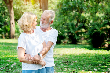Fototapeta premium Senior Caucasian Women and men Standing in garden during summer Which is lover who has been caring for long time Take care of health And travel together in retirement Concepcion insured the elderly