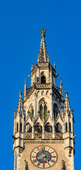 Fototapeta na wymiar munich city hall top of the tower with patron saint Münchner Kindl