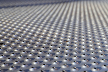 Metal aluminum grate background with copy space for text and graphics