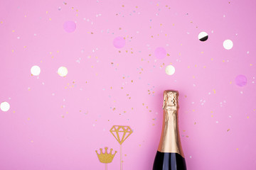 champagne candles confetti celebration pastel background.