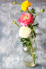 Beautiful flowers bouquets in glass vases