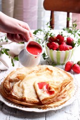 Fresh homemade crepes with strawberries