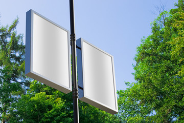 3D rendering of blank billboard (empty advertisement) with clouds. Empty mockup template