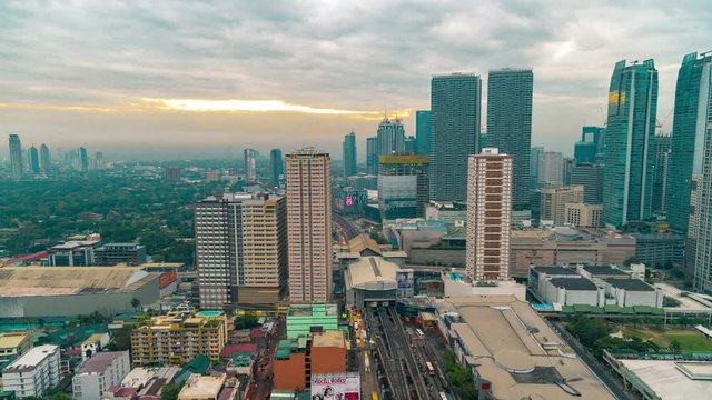 Night to morning view of Mandaluyong, the business district of Metro Manila city, Luzon island, Philippines. Manila, Luzon, Philippines - February, 2019. Aerial view Timelapse 4K
