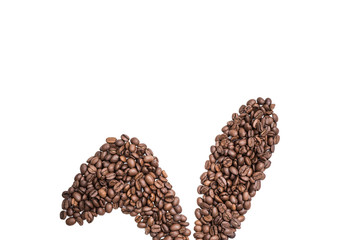 Easter holiday background with bunny ears made of freshly roasted coffee beans on a white background. Creative easter concept. Copy space.
