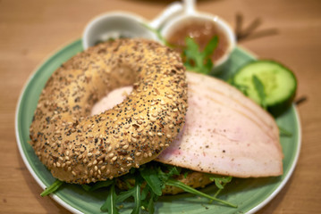 Bagel with turkey , rocket and mango chutney