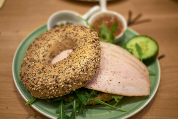 Bagel with turkey , rocket and mango chutney