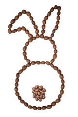 Easter bunny made of freshly roasted coffee beans on a white background. Creative easter concept.