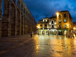 Spain: March 2017: Scenery of the Acueduct of Segovia, top view of Plaza Azoguejo and old building towns in Segovia