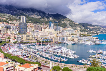 Fototapeta na wymiar Cityscape and harbor of Monte Carlo. Aerial view of Monaco on a Sunny day, Monte Carlo, Principality of Monaco