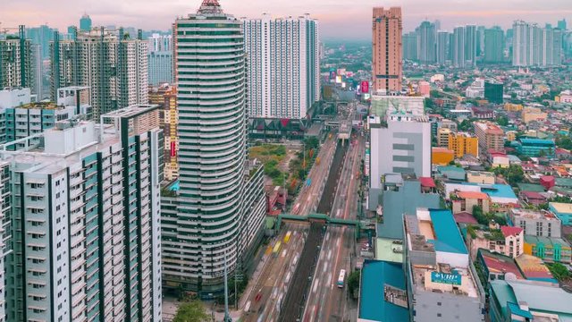 Aerial view skyline and skyscapers of Manila city. Manila is the most densely populated city proper in the world. Manila, Luzon, Philippines - February, 2019. Aerial view Timelapse 4K