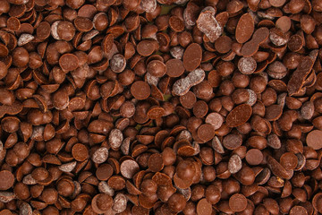 chocolate drops (sweets). food background. copy space. top