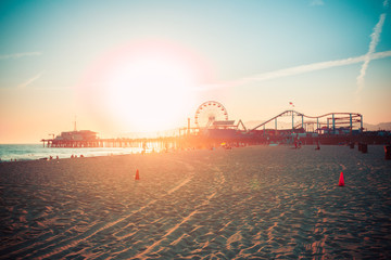 Sunset over Santa Monica beach with famous amusement park