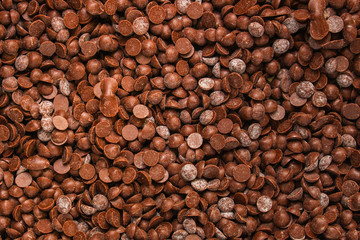 chocolate drops (sweets). food background. copy space. top